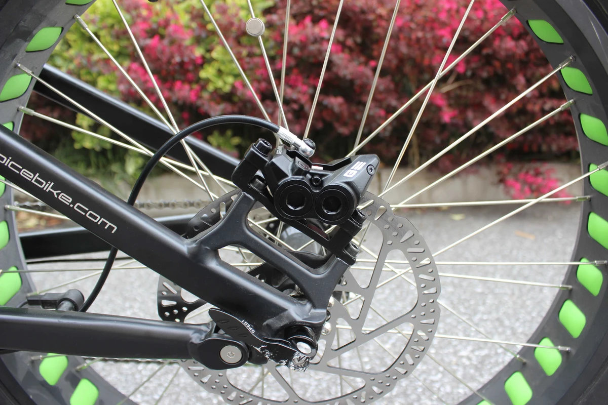 GEMMA caliper and rotor installed on a cargo bike wheel